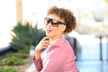 Young Light-Skinned African-American Businesswoman with Afro