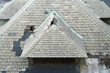  old damaged shingle on the roof © nd700