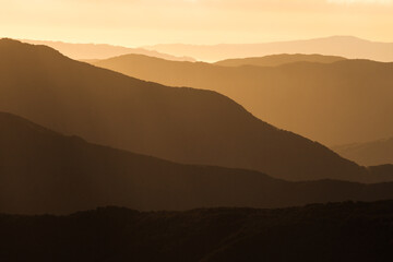 View west from Tarn Ridge Hut across layered ridges, Tararua Forest Park