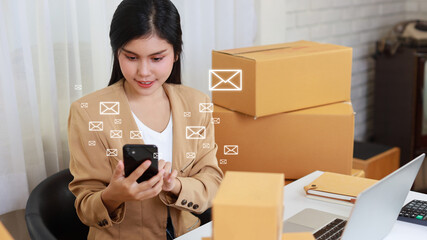 Mail communication technology concept. Young smart asian businesswoman working on computer, mobile...