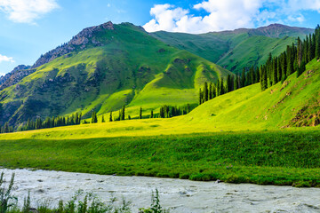 Beautiful mountain and green grassland in Xiata Scenic Area,Xinjiang,China.