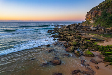 Aerial sunrise over the sea with clear skies