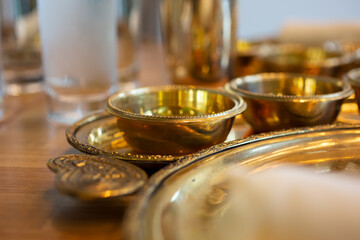 A closeup view of Indian thali tableware.