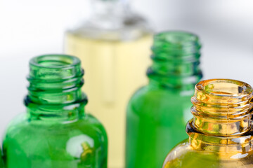 Dropper glass bottles with pipette. Transparent hyaluronic natural beauty product and eco serum skin care concept. Top horizontal view copyspace.