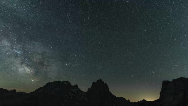 Milkyway And Starry Night Sky Over Rocky Mountains At Collado Jermoso In Picos de Europa National Park In Leon, Spain. low angle, time lapse