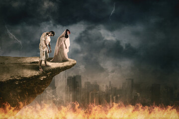 Two ghosts standing on the cliff with burnt city