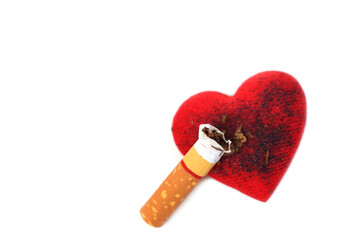 A cigarette burnt a red heart - smoking destroying health concept