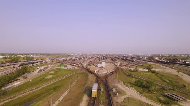 Drone flight over trains, intermodal containers, railway, shipping depot