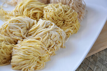 Various Kinds of Homemade Egg Noodles on White Dish