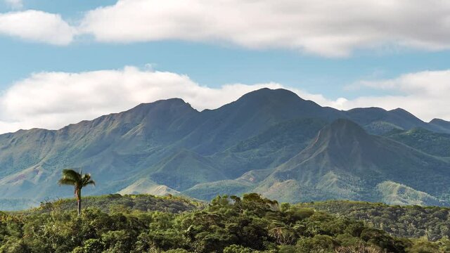 Mount Koghi dominates the paradisiacal landscape of New Caledonia - cloudscape time lapse