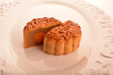 traditional Chinese baked mooncake lotus, egg yolk, red bean, mixed nuts pastry for mid autumn festival