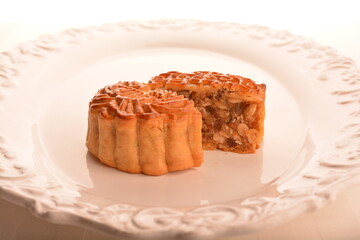 traditional Chinese baked mooncake lotus, egg yolk, red bean, mixed nuts pastry for mid autumn festival