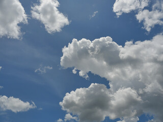Naklejka na ściany i meble Cumulus cloud on beautiful blue sky in day light , Fluffy clouds formations at tropical zone 
