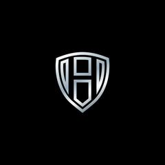 Shield with letter H vector illustration on dark background. Letter shield logo design concept template