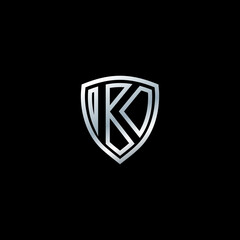 Silver Shield Logo Design for Letter K. Silver Metal Logo. Logo design for cars, companies and others.. Letter shield logo design concept template