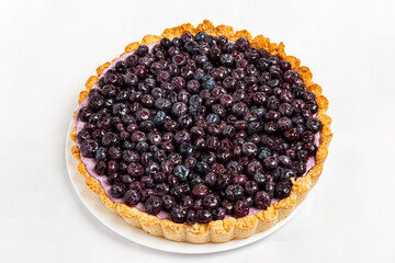 Sweet cheesecake with baked blueberries and cheese