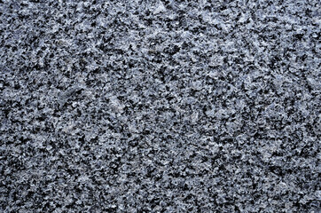 Blue granite texture background. Close-up of granite surface.