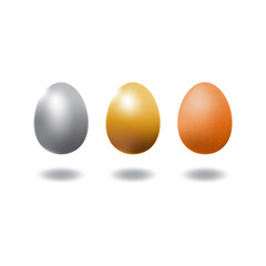 Set of silver, gold and brown chicken eggs.