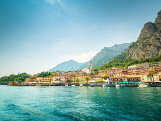 Fototapeta na wymiar Lake view from boat to Limone sul Garda during summer 