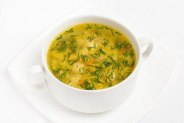 egetable broth with carrots, potatoes and cabbage, peas and bread. Healthy food for children.