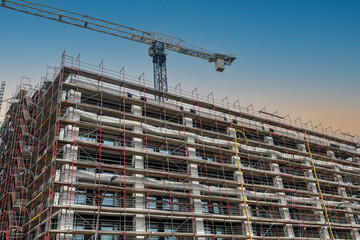 construction site with crane and blue sky in Berlin