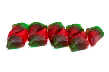 stacked next to each other spicy marmalade in the form of red pepper on a white background