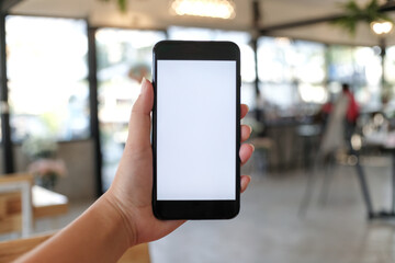 Close up of women's hands holding cell telephone blank copy space screen. smart phone with technology concept