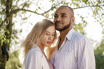 Fototapeta premium Close up of young couple in love enjoying time together outdoors