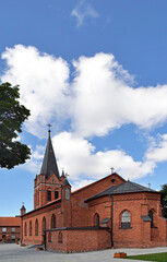 Fototapeta premium General view and architectural details of the Catholic Church of the Exaltation of the Holy Cross built in 1861 in the neo-Gothic style in the city of Olecko in Masuria, Poland.