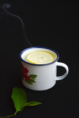 Drinking hot lemonade drink helps to heal the sick or cough or cold from the cold air in a cup