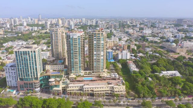 Aerial drone sideways view of George Washington Avenue skyline and skyscrapers in Dominican Republic