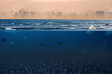 Dirty sea with many garbage bags and plastic product with polluted city on background. Environment...