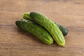 Fersh juicy green cucumbers heap