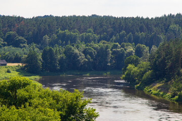 Fototapeta na wymiar Calm waters of the Neris river. Landscapes of Lithuania