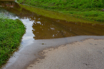 Flooded pedestrian walkway after heavy rain