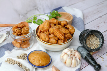 Thai crispy caramel chips - Thai dessert called Krong Krang Krob with some ingredients on the side
