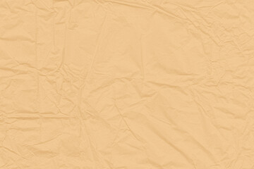 Background from crumpled beige paper.