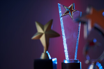star shape trophy on colored background