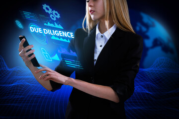 Business, Technology, Internet and network concept. Young businessman working on a virtual screen of the future and sees the inscription: Due diligence