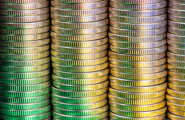 round-shaped metal money stacked in a pile