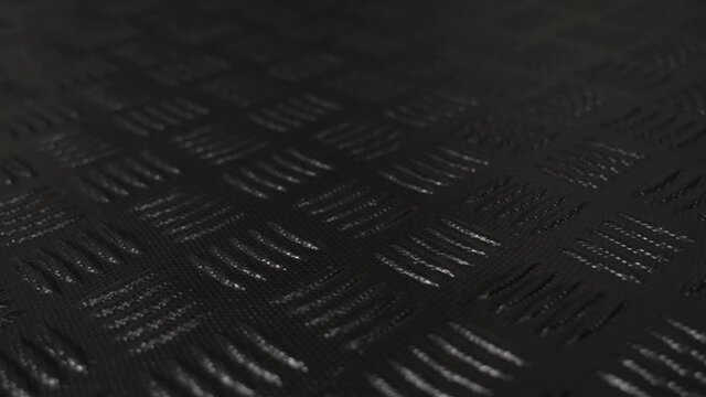 Black background of textured plastic or rubber waterproof material