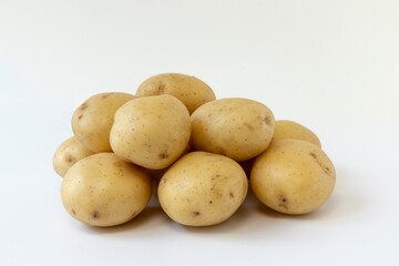 pile of potatoes isolated on white background