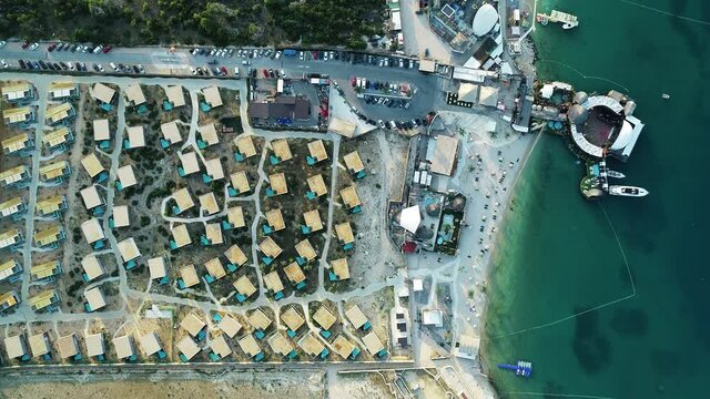 Aerial view of Plaza Zrce, a pebble beach with a famous party scene in Kolan, Zadar province, Croatia.