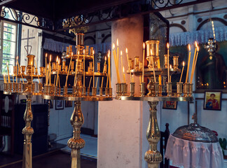 Bulgaria, Asenovgrad, 11th July, 2021. Candles on the stand in The fish church