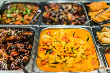 Asian food sold in a shopping mall food court