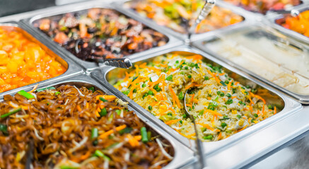Asian food sold in a shopping mall food court