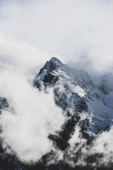 Fototapeta na wymiar Mountain in the clouds