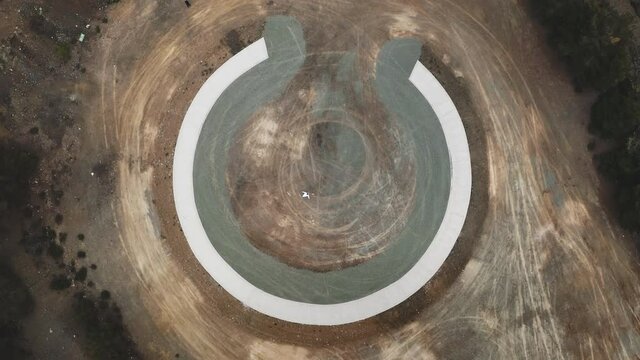 Aerial view, person meets representatives an extraterrestrial civilization on round platform, zoom in. Concept contact with alien intelligence. Colonizing other worlds. Joyful anticipation meeting.