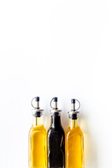 Balsamic and apple cider vinegar in glass bottles top view