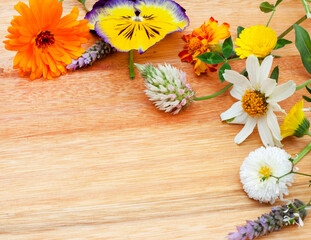 springtime wildflower mixture in flat lay on rustic surface